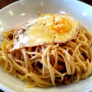 resto brunch pasta with egg on top